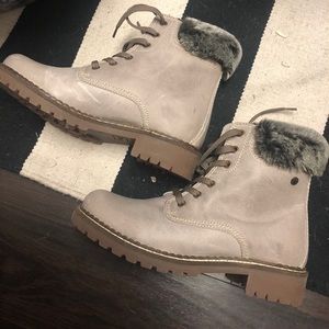 Assortment of Boots, Flops, and Shoes